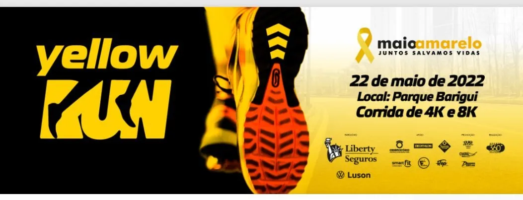 Banner do Maio Amarelo com sola de tênis em destaque sobre fundo amarelo e preto