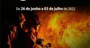 Cartaz vermelho com o título 'Semana de Prevenção Contra Incêndios' e um bombeiro diante das chamas