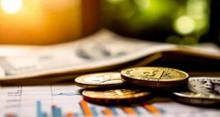Moedas douradas e cédulas sobre gráficos impressos, imagem ilustrativa sobre finanças