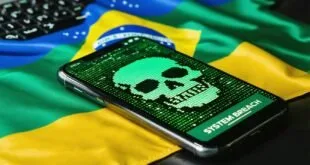 Celular com caveira digital verde e aviso 'System Breach' na tela sobre bandeira do Brasil